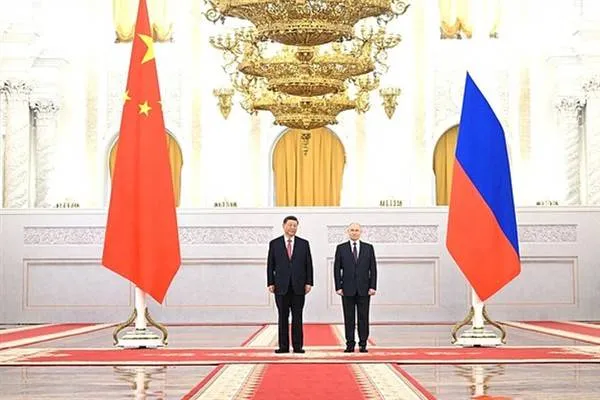 Putîn û Xi Jinping piştî gotûbêjên xwe rêzeya belgeyên rêxistin