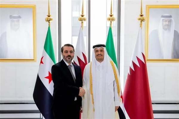 Qatari Foreign Minister Al Thani received Syrian delegation